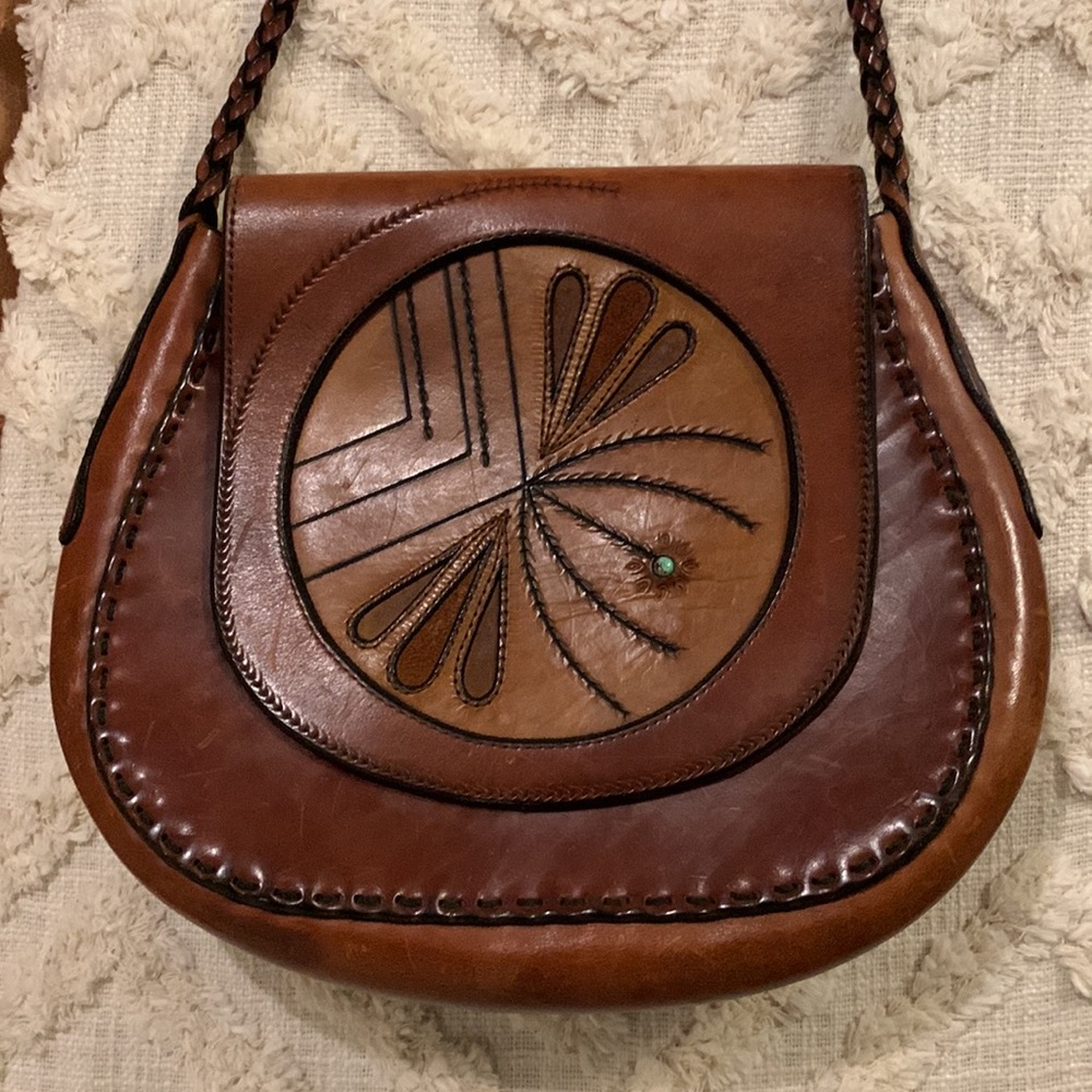 Vintage leather purse with turquoise flower